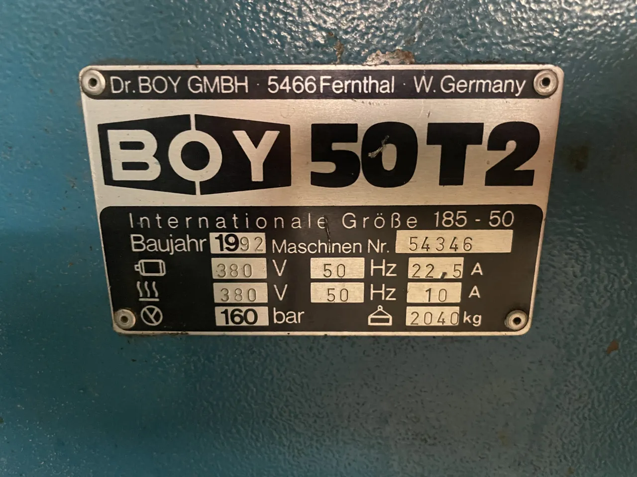N. 1 pressa oleodinamica per stampaggio Boy mod. 15S, n. 1 pressa oleodinamica per stampaggio Boy mod. 50 T”, nastro trasportatore e tramoggia 
